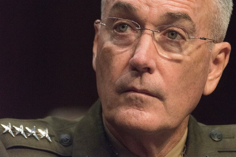 Marine Corps Gen. Joe Dunford, chairman of the Joint Chiefs of Staff, listens to a question during a Senate Armed Services Committee reconfirmation hearing
