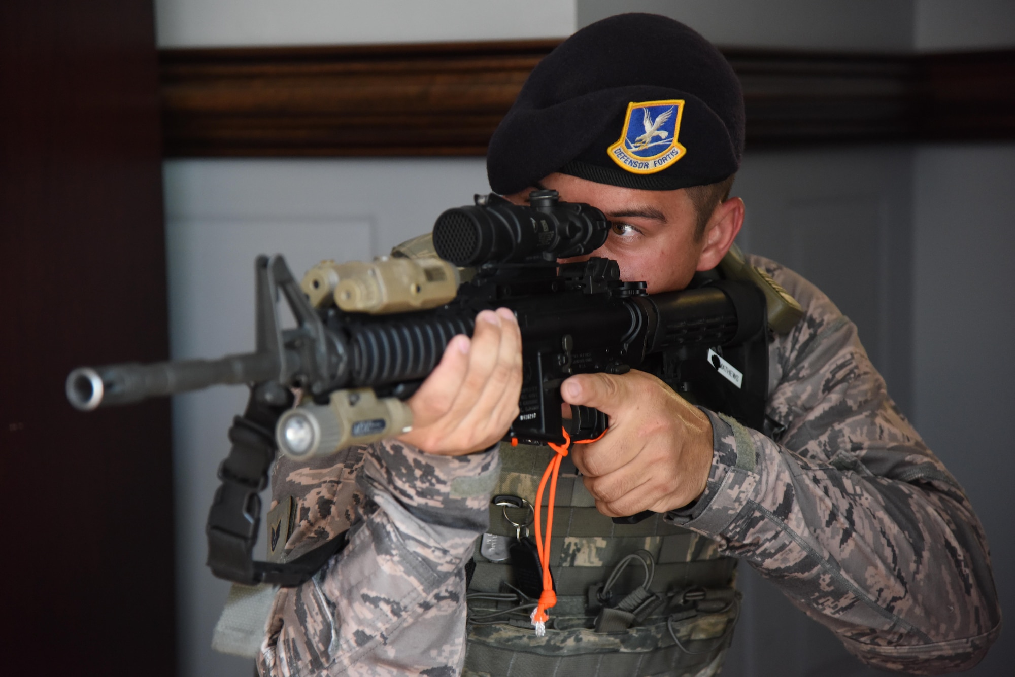 Staff Sgt. James Matthews II, 81st Security Forces Squadron flight sergeant, holds his post during an active shooter exercise at the Larcher Chapel Sept. 21, 2017, on Keesler Air Force Base, Mississippi. An active duty Air Force member simulated opening fire at the Arnold Medical Annex and the Larcher Chapel in order to test the base's ability to respond to and recover from a mass casualty event. (U.S. Air Force photo by Kemberly Groue)
