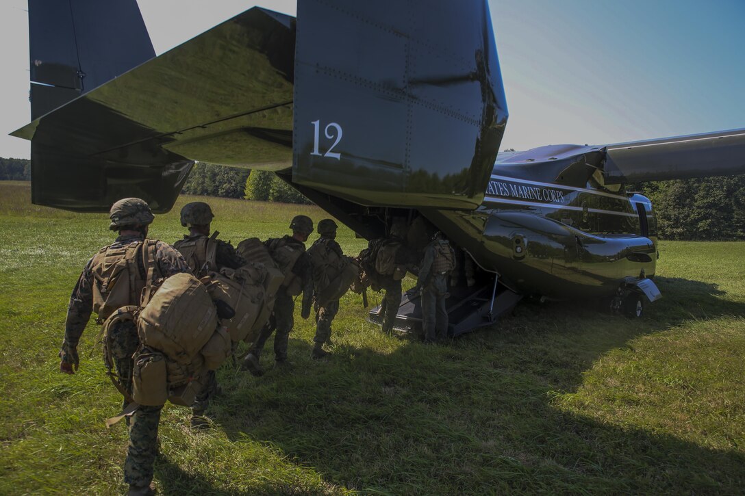 Marines with Marine Barracks Washington D.C. board a U.S. Marine Corps MV-22 Osprey during the Fire Team Leaders Course at Marine Corps at Marine Corps Base Quantico, Va., Sept. 21, 2017. This is the third iteration of the course which is designed to refine the Marines’ infantry skills and strengthen their small unit leadership to prepare them for the fleet. (Official Marine Corps photo by Lance Cpl. Damon Mclean/Released)