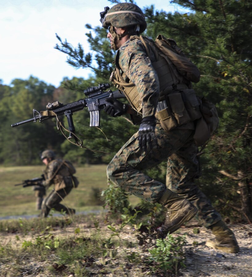 A Marine with Marine Barracks Washington D.C. conducts buddy rush drills during a live-fire training exercise for the Fire Team Leaders Course at Marine Corps Base Quantico, Va., Sept. 20, 2017. The FLTC training evolution began two years ago, making this year’s course the third iteration. It is a course designed to refine the Marines’ infantry skills and strengthen their small unit leadership to prepare them for the fleet. (Official Marine Corps photo by Lance Cpl. Damon Mclean/Released)