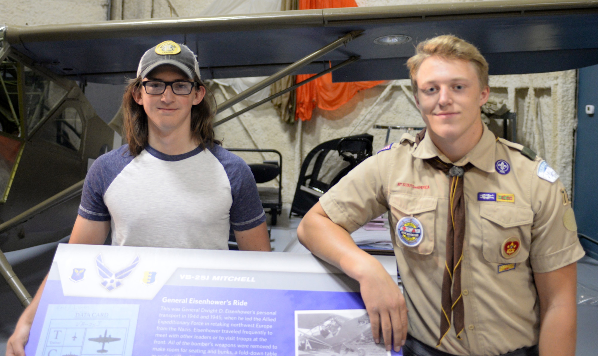 Andrew Worley and Ryan Ahrenstorff, eagle scouts with Troop 72 from Rapid City, stand next to a sign they assembled in Box Elder, S.D., Sept. 23, 2017. Worley and Ahrenstorff helped the South Dakota Air and Space Museum’s Adopt-a-Plane Program which was established to keep the static displays in pristine condition for future generations to enjoy. (U.S. Air Force photo by Airman 1st Class Thomas Karol)