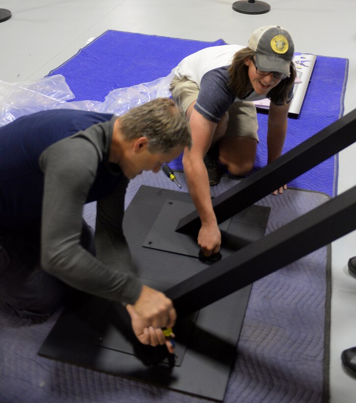 Andrew Worley, an eagle scout with Troop 72, and Rodd Ahrenstorff, the assistant scout master for Troop 72 from Rapid City, help assemble a sign as part of the Adopt-a-Plane Program, in Box Elder, S.D., Sept. 23, 2017. Worley is helping the museum as a part of his Eagle Scout Service Project and is assisting with the South Dakota Air and Space Museum’s Adopt-a-Plane Program which was established to help maintain the displays at the museum and prevent them from degrading. (U.S. Air Force photo by Airman 1st Class Thomas Karol)