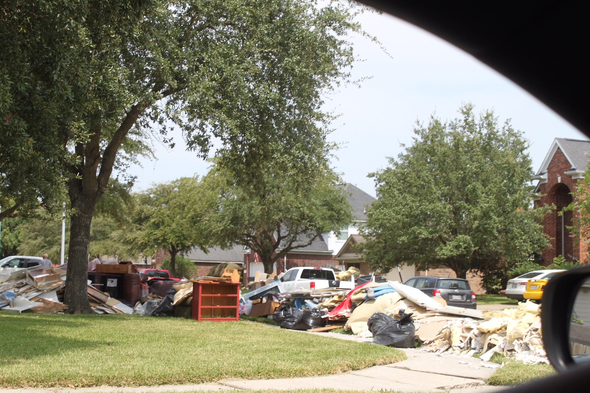 A residential neighborhood in Baytown, Texas after home owners removed all of the storm surge from Hurricane Harvey damaged furniture and clothing Sept. 5, 2017. After a storm any water damaged furnishings need to be thrown out due to the hazardous mold which thrives in moist, warm conditions. (Courtesy Photo)
