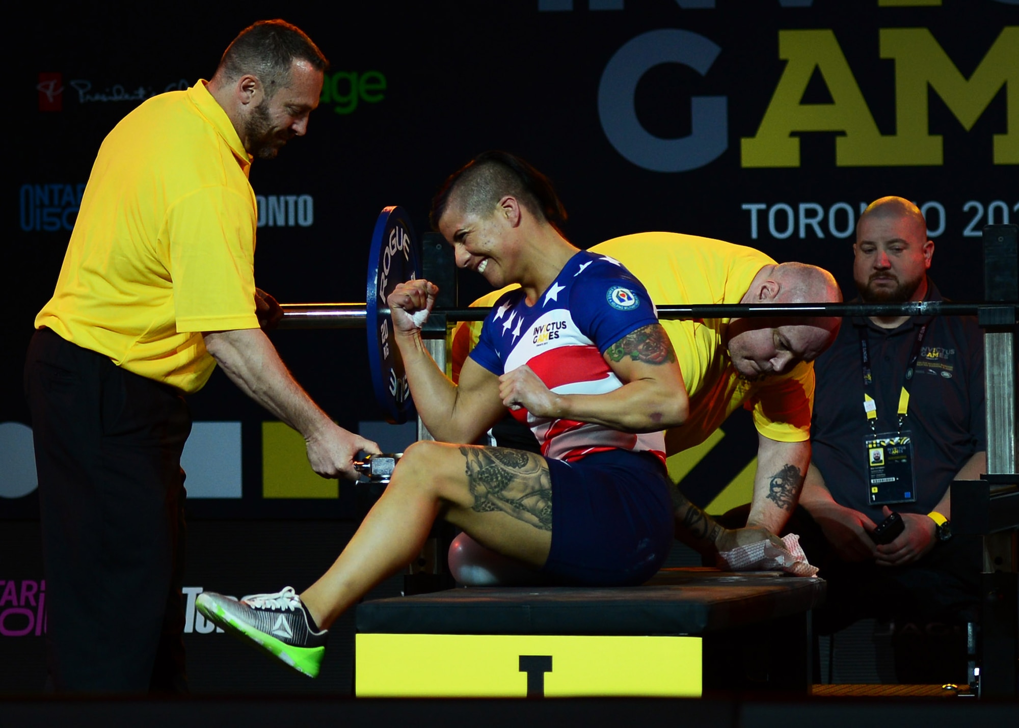 Air Force veteran Sebastiana Lopez, a former C-17 crew chief staff sergeant and member of Team U.S., enjoys a personal moment of victory following a successful lift during the women’s lightweight powerlifting competition at the Mattamy Sports Centre in Toronto, Canada, Sept. 25, 2017. Lopez claimed gold for the U.S. team during this event as part of the 2017 Invictus Games. (U.S. Air Force photo by Staff Sgt. Chip Pons)