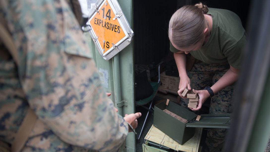 U.S. Marine Pfc. Olivia Rutherford, an ammo technician with Combat Logistics Battalion 5 (CLB-5), Combat Logistics Regiment 1, 1st Marine Logistics Group, counts out ammunition during Mountain Training Exercise 4-17 at Mountain Warfare Training Center, August 4, 2017. Blanks were handed to Marines to be used on the convoys in case of simulated enemy contacts. Throughout the training evolution, Marines with CLB-5 received over 9000 blank ammunition for the M16A4 service rifle for practical experience and utilizing their weapons. (U.S. Marine Corps photo by Lance Cpl. Timothy Shoemaker)
