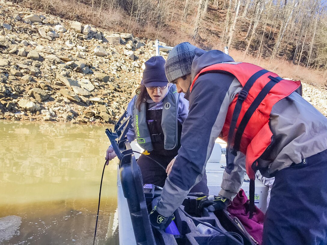 Louisville District Water Quality Biologist Jennifer Thomason and Huntington District Water Quality Biologist Thaddeus Tuggle collect field data to determine if the unexplained bloom of Daphnia lumoholtzi affected water quality parameters.