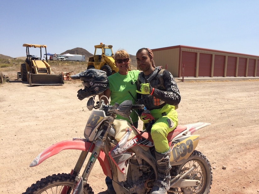 Air Force Staff Sgt. Thomas Tangedal, an aircraft metal technology journeyman with the 22nd Maintenance Squadron, poses for a photo with his mother, Jill Tandegal, in Las Vegas in 2016. Tangdal grew up in the motocross racing world helping friends and family as a pit crew member. Courtesy photo
