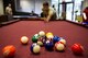 An Airman begins a game of billiards, Sept. 22, 2017, at Moody Air Force Base, Ga. The 23d Civil Engineer Squadron dorm management office is revamping the day rooms to help foster better wingmanship and morale among Airmen living in the dorms. (U.S. Air Force photo by Airman 1st Class Erick Requadt)