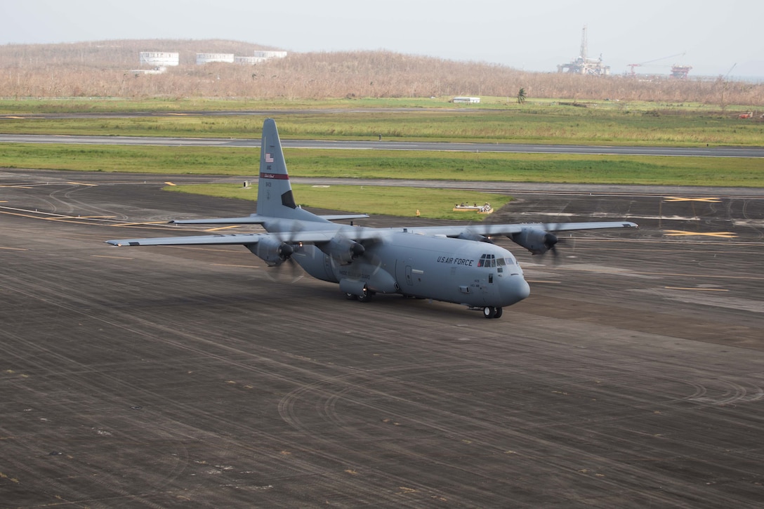 A U.S. Air Force C-130 Hercules aircraft transport aircraft lands at the Jose Aponte de la Torre Airport, Puerto Rico, Sept. 26, 2017. The 26th Marine Expeditionary Unit, and other services of Department of Defense, is supporting the Federal Emergency Management Agency, the lead federal agency, and local authorities in Puerto Rico and the U.S. Virgin Islands with the combined goal of protecting the lives and safety of those in affected areas. (U.S. Marine Corps photo by Lance Cpl. Alexis C. Schneider)