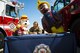 Col. Jennifer Short, 23d Wing commander, poses for a picture with 23d Civil Engineer Squadron mascots, Sparky and Fireman Fred, Sept. 25, 2017, at Moody Air Force Base, Ga. Short proclaimed the week of Oct. 8-14 as Fire Prevention Week, which is designed to commemorate the sacrifices of our firefighters and teach fire safety to others. (U.S. Air Force photo by Airman 1st Class Erick Requadt)