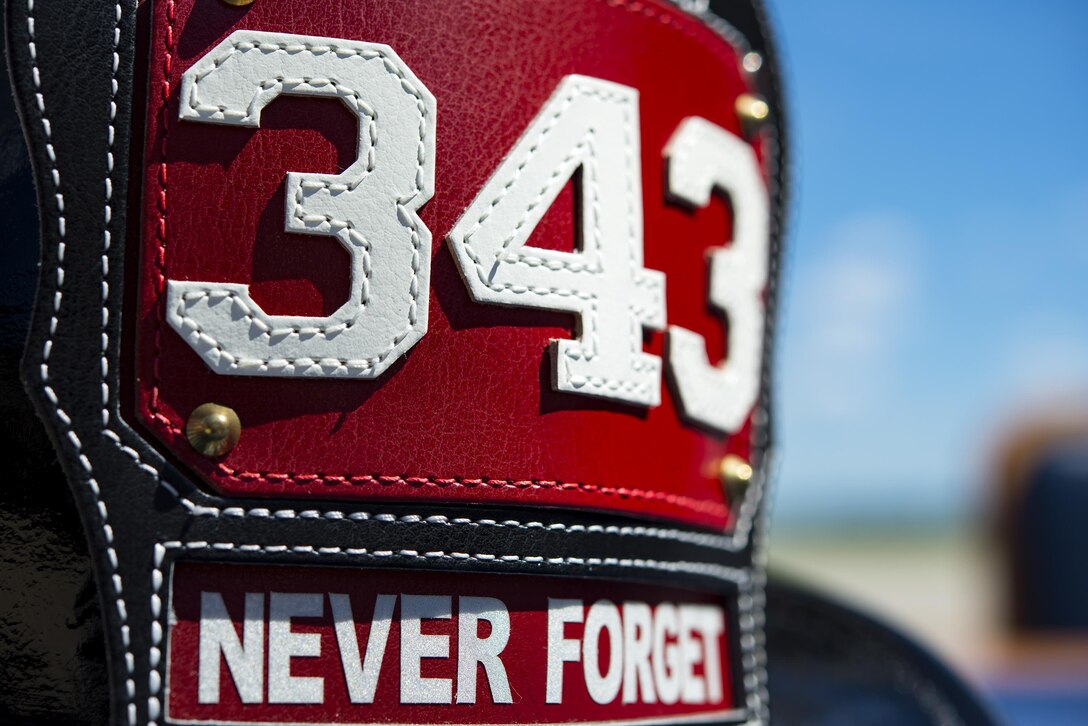 A fire helmet from the 23d Civil Engineer Squadron fire department rests on a table, Sept. 25, 2017, at Moody Air Force Base, Ga. Col. Jennifer Short, 23d Wing commander, proclaimed the week of Oct. 8-14 as Fire Prevention Week, which is designed to commemorate the sacrifices of our firefighters and teach fire safety to others. (U.S. Air Force photo by Airman 1st Class Erick Requadt)