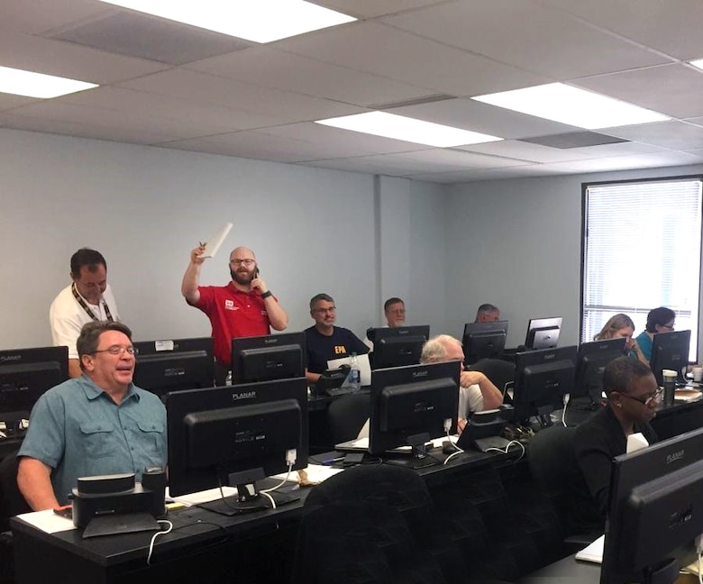 Mark Crawford works in a call center while deployed to Tallahassee, Fla., for Hurricane Irma recovery efforts. The status of more than 98 percent of the community water systems and 88 percent of the wastewater systems has been determined and categorized.