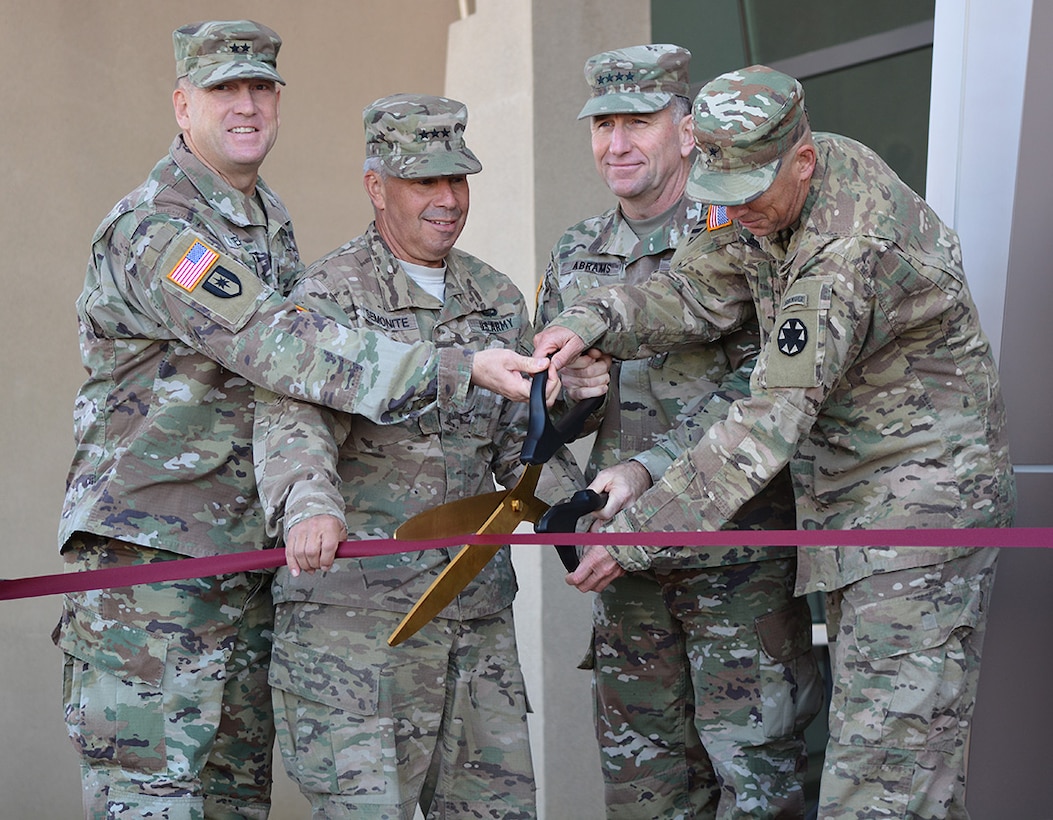 From left to right, Maj. Gen. Thomas Tempel Jr., commanding general, Regional Health Command-Central; Lt. Gen. Todd Semonite, commanding general, U.S. Army Corps of Engineers; Gen. Robert Abrams, commanding general, U.S. Army Forces Command; and Brig. Gen. Jeff Broadwater, commanding general, National Training Center and Fort Irwin, cut the ribbon during a Sept. 21 ceremony signifying the opening of the new Weed Army Community Hospital at Fort Irwin, California