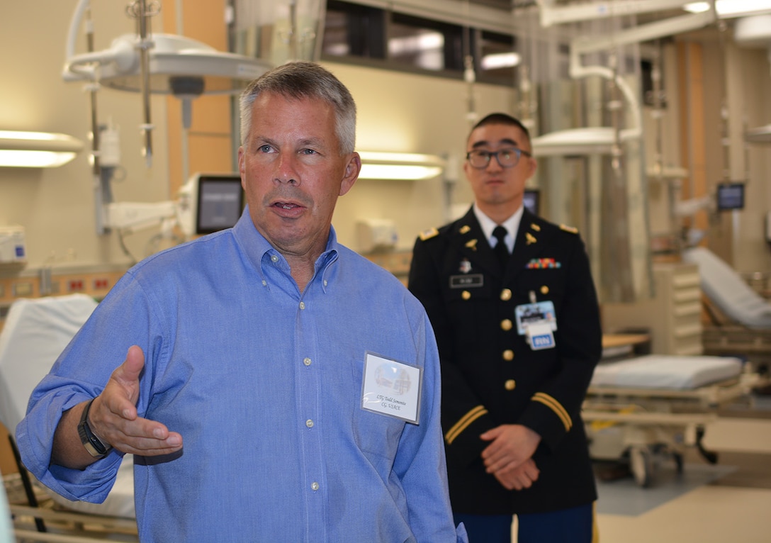 Lt. Gen. Todd Semonite, commanding general, U.S. Army Corps of Engineers, left, asks a question during a Sept. 20 tour of the new Weed Army Community Hospital at Fort Irwin, California.