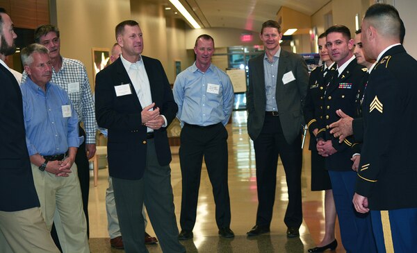Soldiers brief Lt. Gen. Todd Semonite, commanding general, U.S. Army Corps of Engineers, second from left, and Maj. Gen. Thomas Tempel, commanding general, Regional Health Command-Central, third from left, about the new Weed Army Community Hospital during a Sept. 20 tour of the facility.