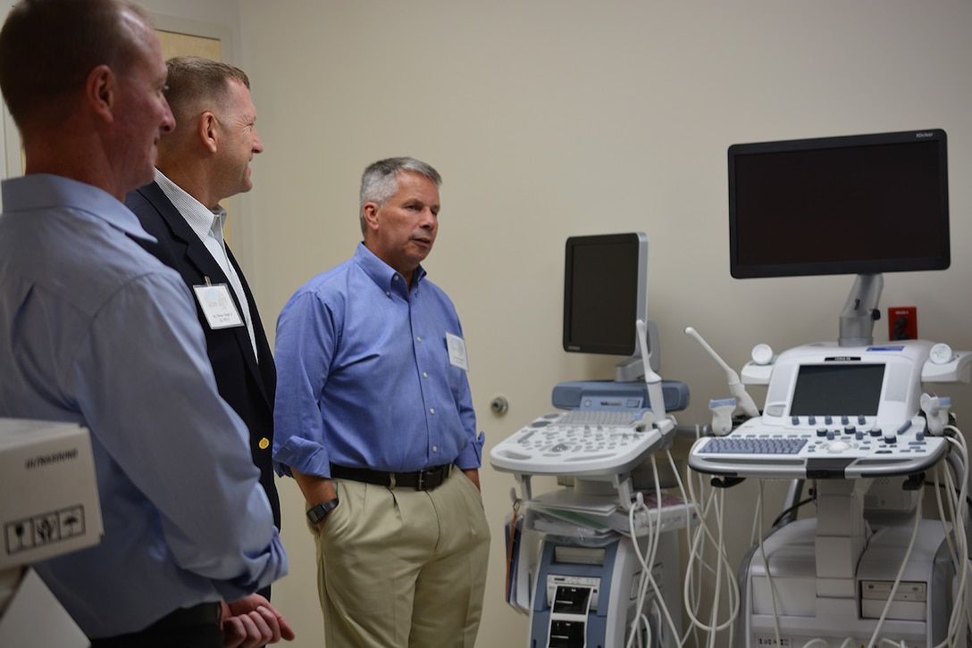 From left to right, Col. Kirk Gibbs, U.S. Army Corps of Engineers Los Angeles District commander; Maj. Gen. Thomas Tempel Jr., commanding general, Regional Health Command-Central; and Lt. Gen. Todd Semonite, commanding general, U.S. Army Corps of Engineers, listen to a briefing during a Sept. 20 tour of the new Army Weed Community Hospital at Fort Irwin, California.