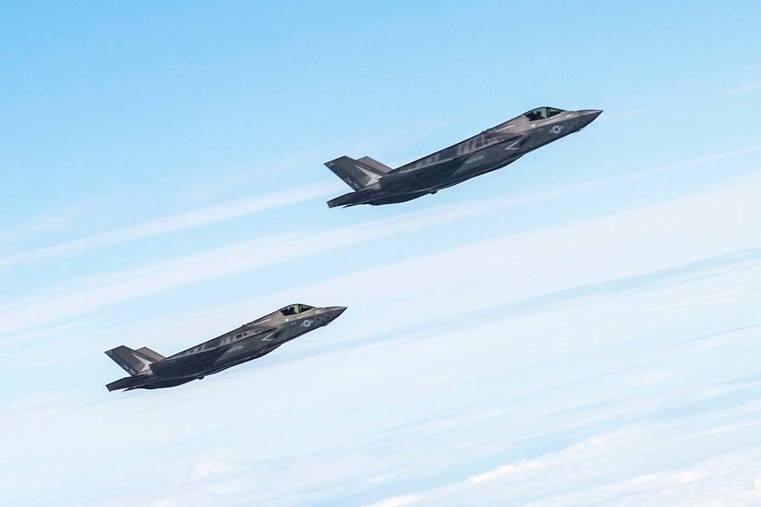 Marine Corps F-35B Lightning II aircraft participate in an aerial refueling training.