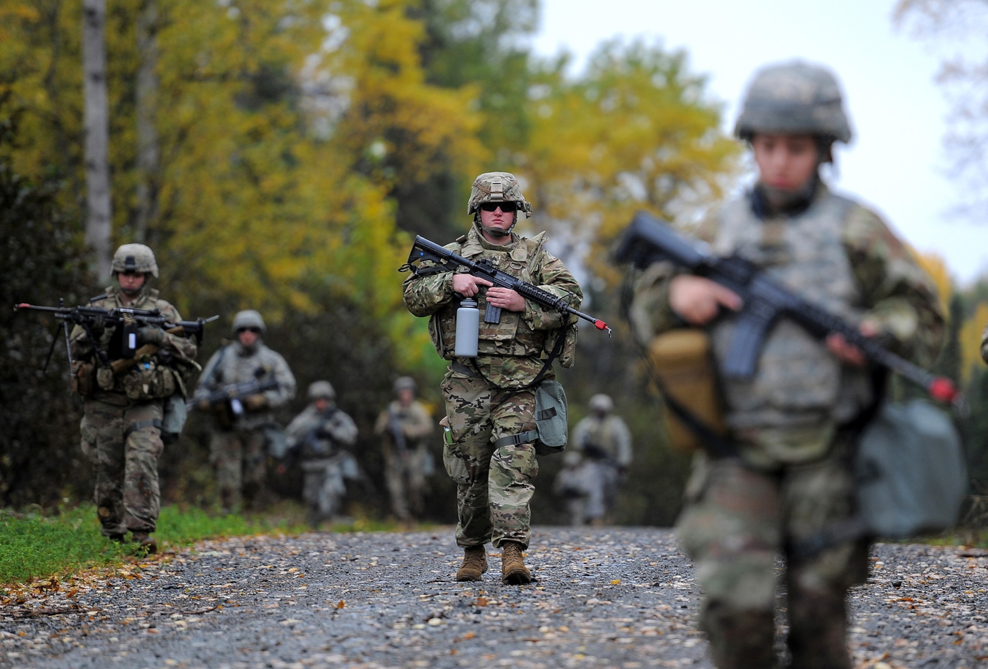 Army Sgt. Justin Mitchell, assigned to the 109th Transportation Company "Muleskinners", 17th Combat Sustainment Support Battalion, U.S. Army Alaska, executes tactical movement on Joint Base Elmendorf-Richardson, Alaska, Sept. 21, 2017.  The transportation Soldiers performed this training as part of a larger exercise in multiple locations to build, and maintain proficiency in essential soldiering skills.