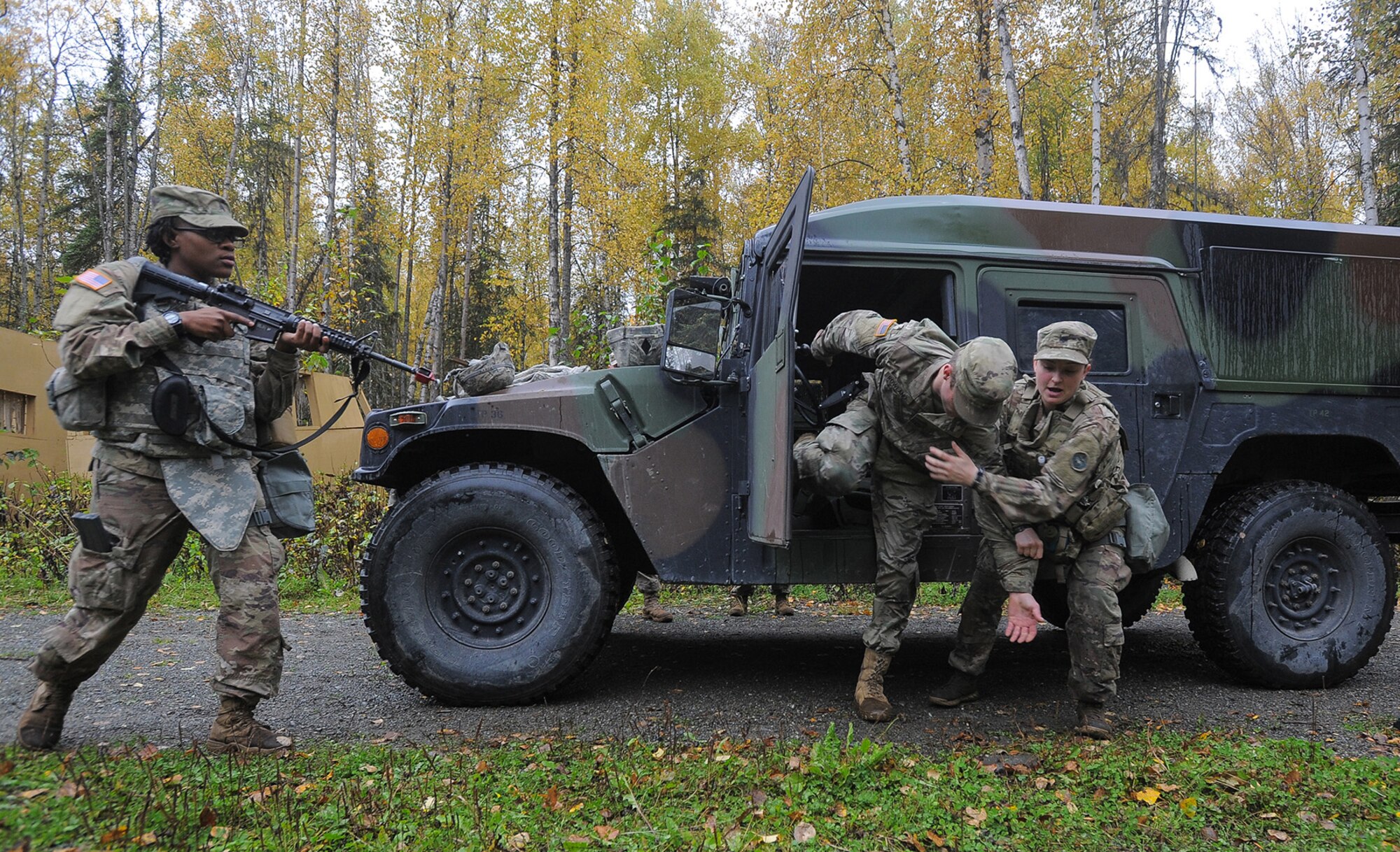 Spc. Shelbe Butner, right, assigned to the 109th Transportation Company "Muleskinners", 17th Combat Sustainment Support Battalion, U.S. Army Alaska, demonstrates a combatives technique during traffic control point training on Joint Base Elmendorf-Richardson, Alaska, Sept. 21, 2017.  The Soldiers performed this training as part of a larger exercise in multiple locations to build, and maintain proficiency in essential soldiering skills.