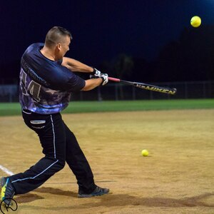 Tech. Sgt. Kory Strandquist, gets ahold of one during the Dept. of Defense softball tournament in San Antonio, Texas.(Courtesy Photo)