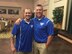 Tech. Sgt. Kory Strandquist (right) reunites with his friend Leonard Anderson at the opening ceremonies of the softball tournament. (Courtesy Photo)