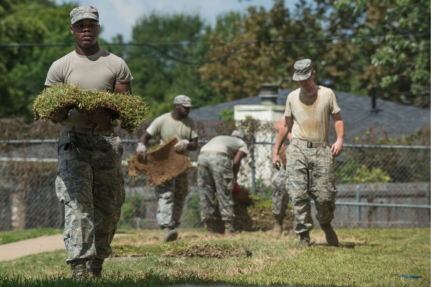 Airmen assigned to the 307th Civil Engineer Squadron lay sod on Sept. 27, 2017, Barksdale Air Force Base, La.