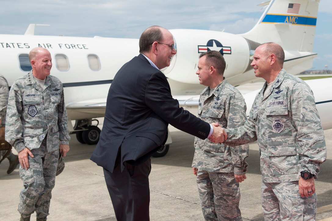 On Sept. 20, 2017, the Honorable Matthew P. Donovan, the Under Secretary of the Air Force shakes Col. Kurt Matthews, 920th Rescue Wing commander upon arrival to Patrick Air Force Base, Florida. He and General Stephen W. Wilson, the Vice Chief of Staff of the U.S. Air Force, thanked several hundred 920th RQW for their relief efforts after two major hurricanes battered Texas then Florida, back-to-back. The 920th RQW sent a contingent of 95 wing Airmen and 5 rescue aircraft to conduct rescues from Eastern Airport, College Station, Texas August 27, 2017. With little time to spare, the 920th begin responding to Texans in need within 45 minutes of their arrival. A week later they were getting ready to do the same thing at home in response to Hurricane Irma. (U.S. Air Force photo/Matthew Jurgens)