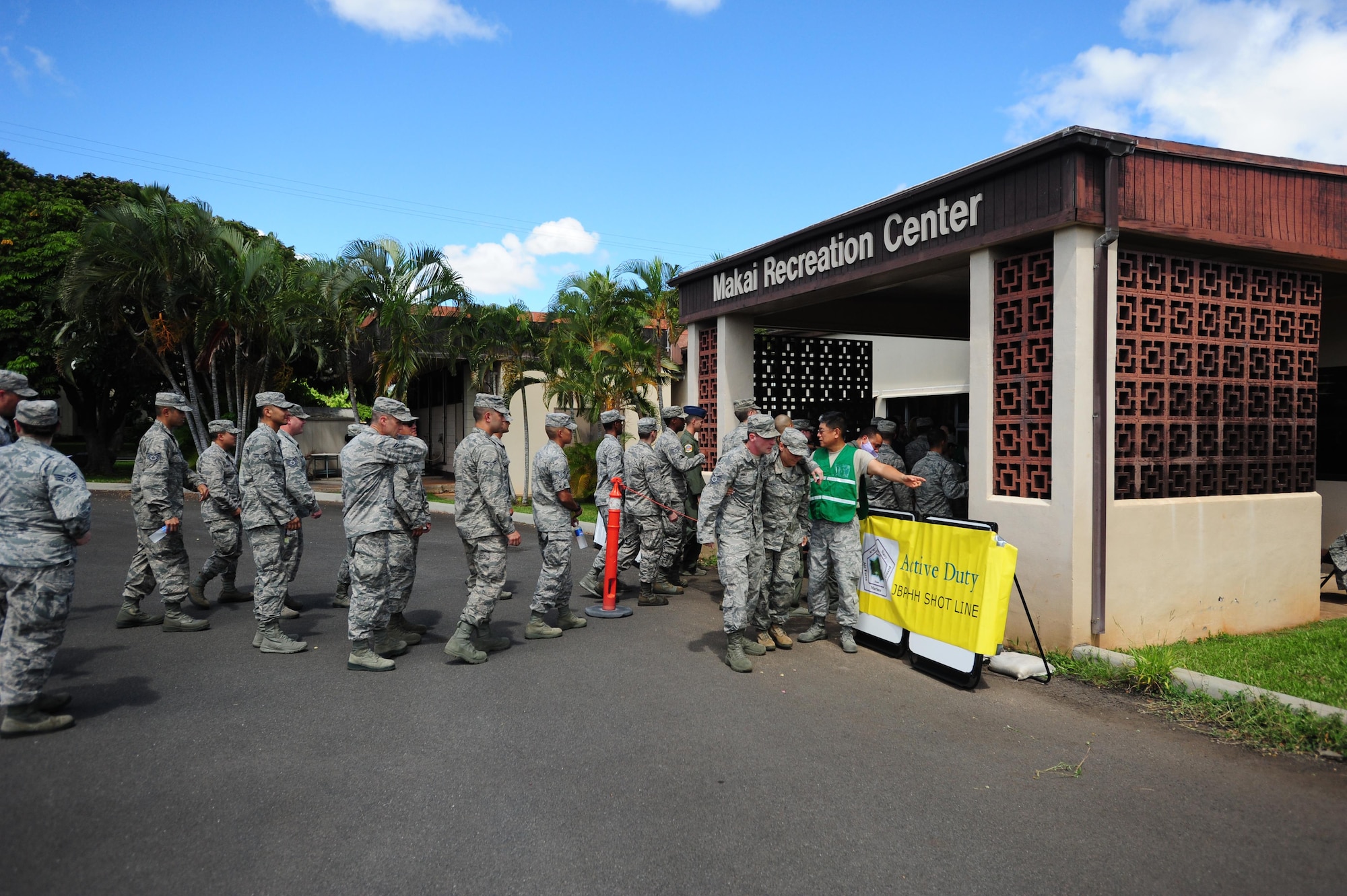 Airmen form a line before entering Makai Recreation Center.