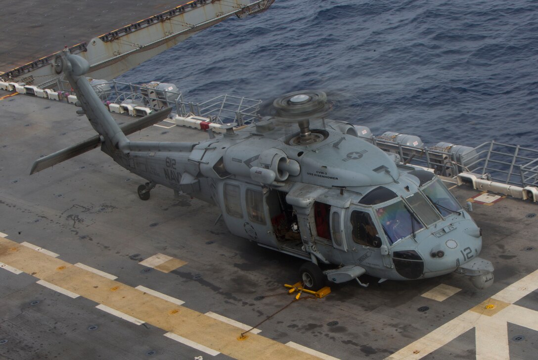 A U.S Navy MH-60S Seahawk helicopter with Helicopter Sea Combat Squadron 7, Expeditionary Strike Group 2, prepares for takeoff aboard the amphibious assault ship USS Kearsarge (LHD 3) in support of Hurricane Maria relief efforts in the Caribbean Sea, Sept. 27, 2017.  The 26th MEU is supporting Federal Emergency Management Agency, the lead federal agency, in helping those affected by Hurricane Maria to minimize suffering and is one component of the overall whole-of-government response effort. (U.S. Marine Corps photo by Cpl. Juan A. Soto-Delgado)