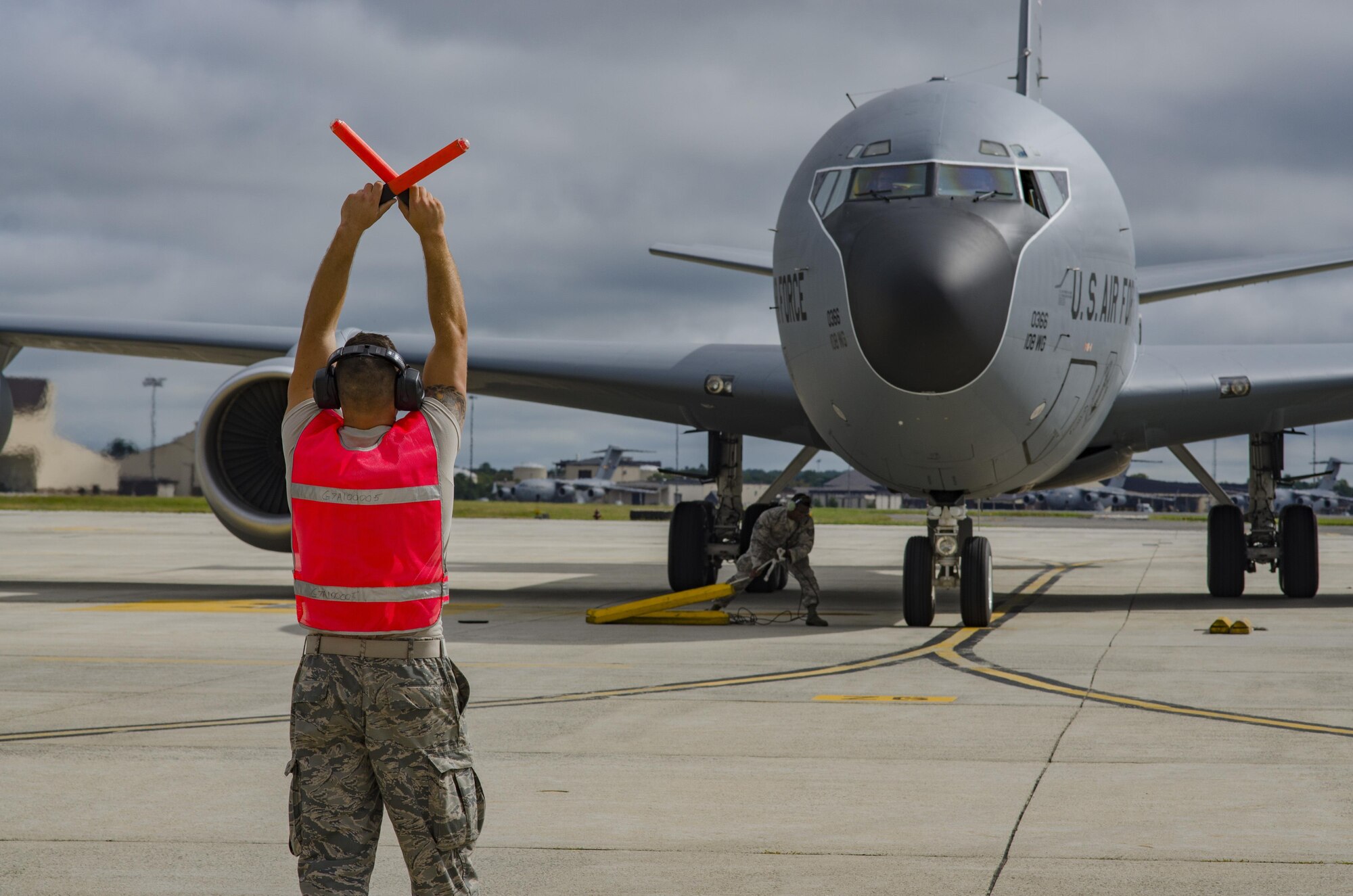 New Jersey Air National Guardsman Senior Airmen Joshua O’Reilly, crew chief, marshals a 108th Wing KC-135 Stratotanker to its parking spot on the flight line at Joint Base McGuire-Dix-Lakehurst, N.J., Sept. 26, 2017. The tanker and its crew returned from supporting Andersen Air Force Base’s ongoing refueling mission. (U.S. Air National Guard photo by Staff Sgt. Ross A. Whitley/Released)