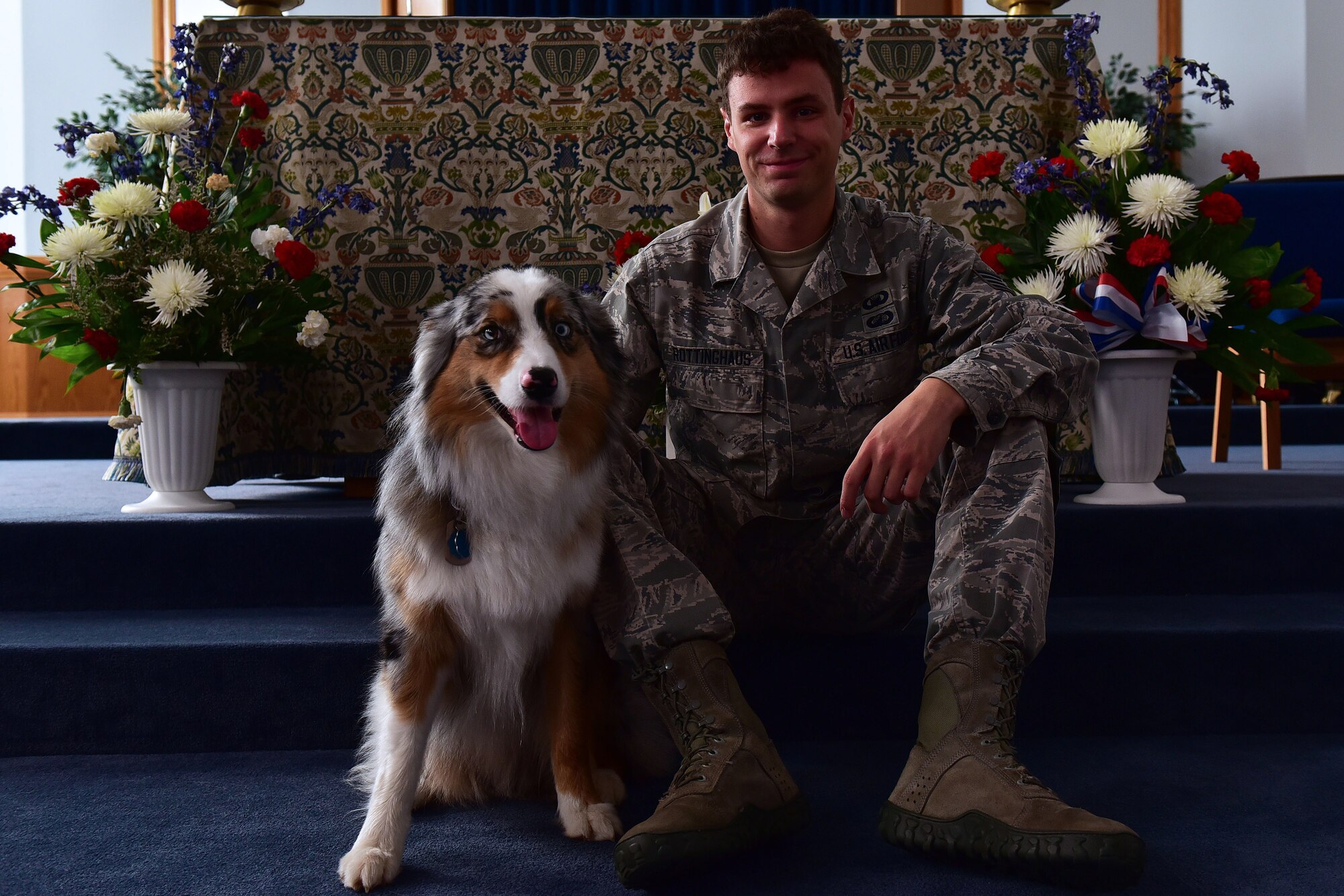 Staff Sgt. Kolton Rottinghaus trained to become Milo’s handler. Milo is a two-year-old Australian Shepherd. (U.S. Air Force photo by Airman Rhett Isbell)