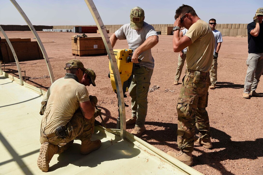 Airmen continue to build tents.
