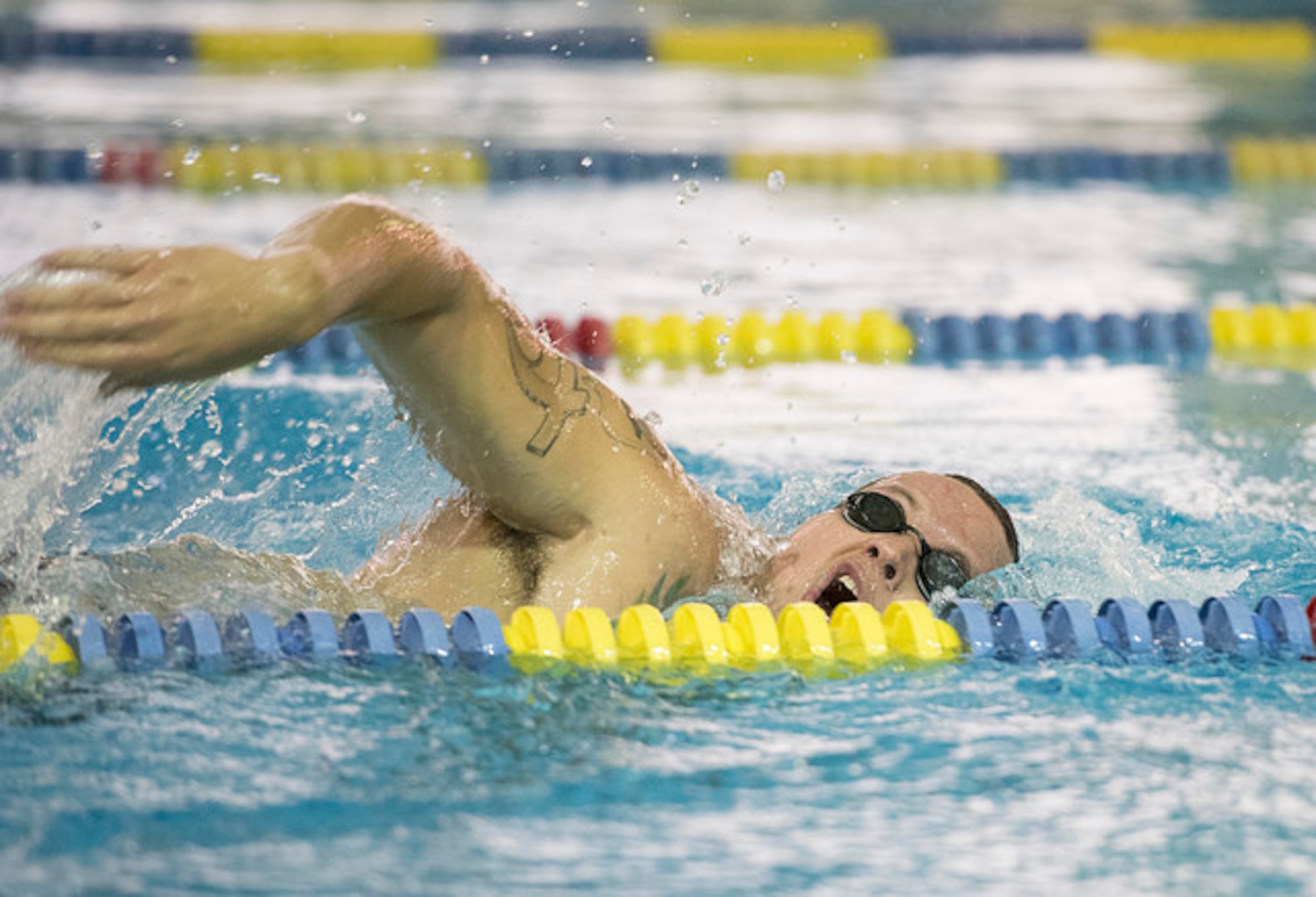 U.S. Marine Corps Gunnery Sgt. Dorian Gardner, training and operations chief with the Headquarters U.S. Marine Corps Training Command Public Affairs office, swims the freestyle during practice for the 2017 Invictus Games in Toronto, Canada, Sept. 22, 2017. Gardner is one of the nearly 80 athletes who comprise this year’s U.S. team. (U.S. Army photo by Pfc. Seara Marcsis)