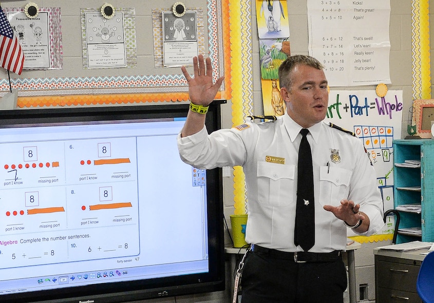 Will O’Meara, 14th Civil Engineer Squadron Health and Safety Officer, speaks to a first-grade classroom at Caledonia Elementary School Sept. 26, 2017, in Caledonia, Mississippi. Fire and emergency service members from Columbus Air Force Base, Mississippi, went to the school to bring recognition to Fire Prevention Week. The week places emphasis on a number of items such as checking fire detectors and knowing who to call in case of an emergency along with many other prevention and safety measures. (U.S. Air Force photo by Staff Sgt. Christopher Gross)