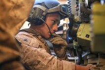 A U.S. Marine with 1st Light Armored Reconnaissance Battalion, 1st Marine Division (MARDIV), sites in an M242 Bushmaster chain-driven automatic cannon weapon during the Deep Strike II exercise at River Valley, Calif., Sept. 14, 2017. The exercise allowed 1st MARDIV Marines to train with 1st Marine Logistics Group Marines in order to combine the efforts of ground and logistics combat elements in one long range military operation. (U.S. Marine Corps photo by Cpl. Austin Mealy)