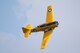 A U.S. Air Force, North American AT-6 Texan, piloted by Eric Hollingsworth of Madison, Miss., makes a photo run during the “Wings Over The Rock Air Show and Car Show” at the North Little Rock Airport, in North Little Rock Airport, Ark., Sept. 23, 2017. The aircraft is an advanced trainer which was used to train pilots during World War II and into the 1970s. (U.S. Air Force photo by Master Sgt. Jeff Walston/Released)