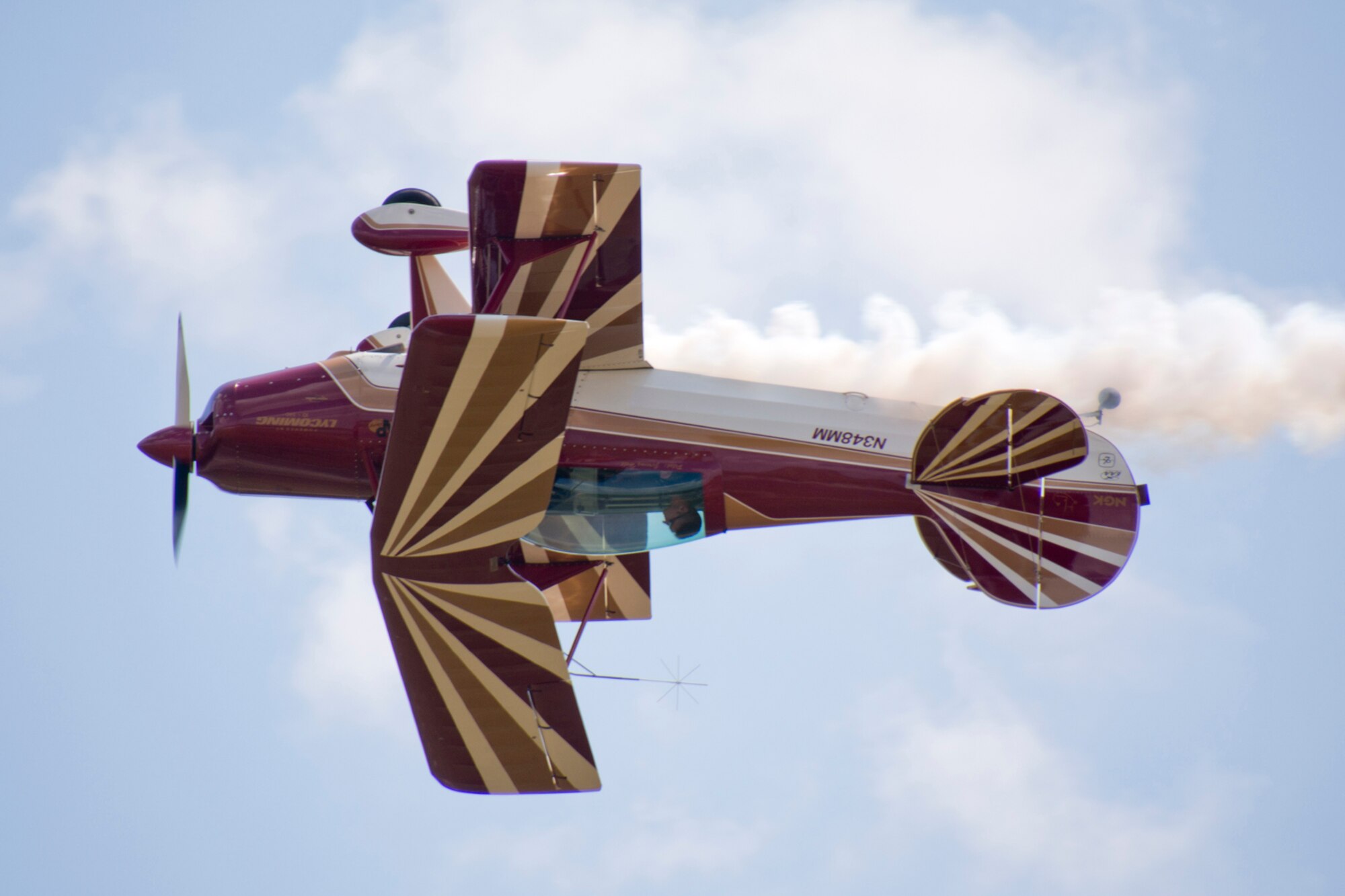 Jeremy Holt pilots his biplane through a series of aerobatic maneuvers for a crowd of thousands during the “Wings Over The Rock Air Show and Car Show” at the North Little Rock Airport, in North Little Rock Airport, Ark., Sept. 23, 2017. Holt is a U.S. Air Force Reserve B-52 Stratofortress pilot assigned to the 93rd Bomb Squadron, 307th Bomb Wing at Barksdale Air Force Base, La. This is his fifth year flying this aircraft. (U.S. Air Force photo by Master Sgt. Jeff Walston/Released)