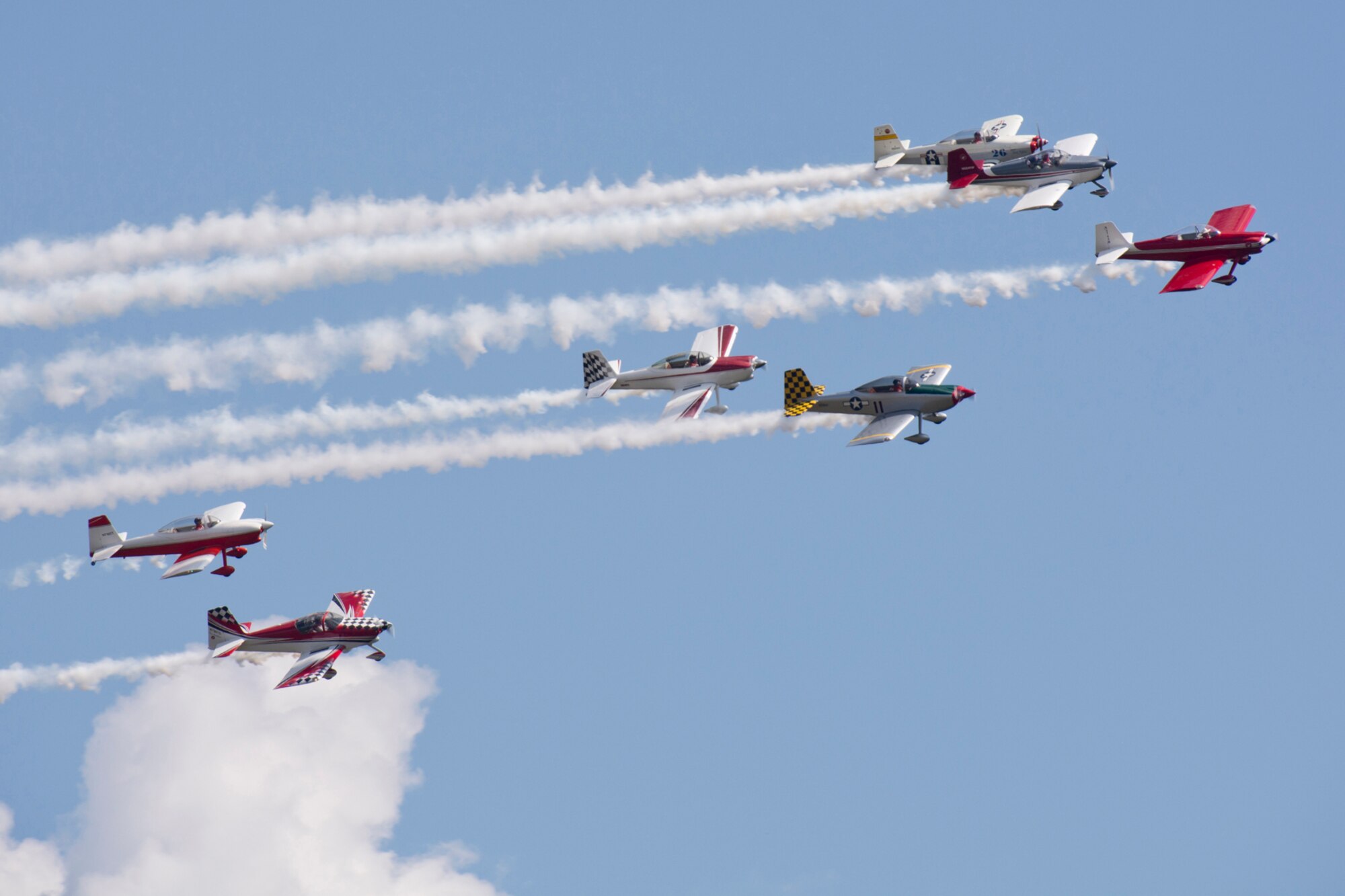 Bulldog Flight Formation makes a pass in front of the crowd at the “Wings Over The Rock Air Show and Car Show” at the North Little Rock Airport, in North Little Rock Airport, Ark., Sept. 23, 2017. The Bulldog Flight, which was founded in 2010, and is the largest civilian formation team in Arkansas, flies Experimental RV aircraft. (U.S. Air Force photo by Master Sgt. Jeff Walston/Released)