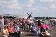 Thousands of spectators experience the “Wings Over The Rock Air Show and Car Show” at the North Little Rock Airport, in North Little Rock Airport, Ark., Sept. 23, 2017. Both military units and civilian groups provided static displays for the air show, which included vintage military aircraft and various aerobatic performances. (U.S. Air Force photo by Master Sgt. Jeff Walston/Released)