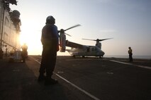 U.S. 5TH FLEET AREA OF OPERATIONS (Sept. 26, 2017) – Sailors with the America Amphibious Ready Group prepare an MV-22B Osprey for take off aboard the amphibious assault ship USS America (LHA 6). The Osprey is designed for expeditionary assault support, raid operations, cargo lift and support to special warfare, it is capable of vertical takeoff and landing, and short and takeoff and landing (VSTOL). The 15th Marine Expeditionary Unit is embarked on the America ARG and is deployed to maintain regional security in the U.S. 5th Fleet area of operations. (U.S. Marine Corps photo by Lance Cpl. Dusty Kilcrease)