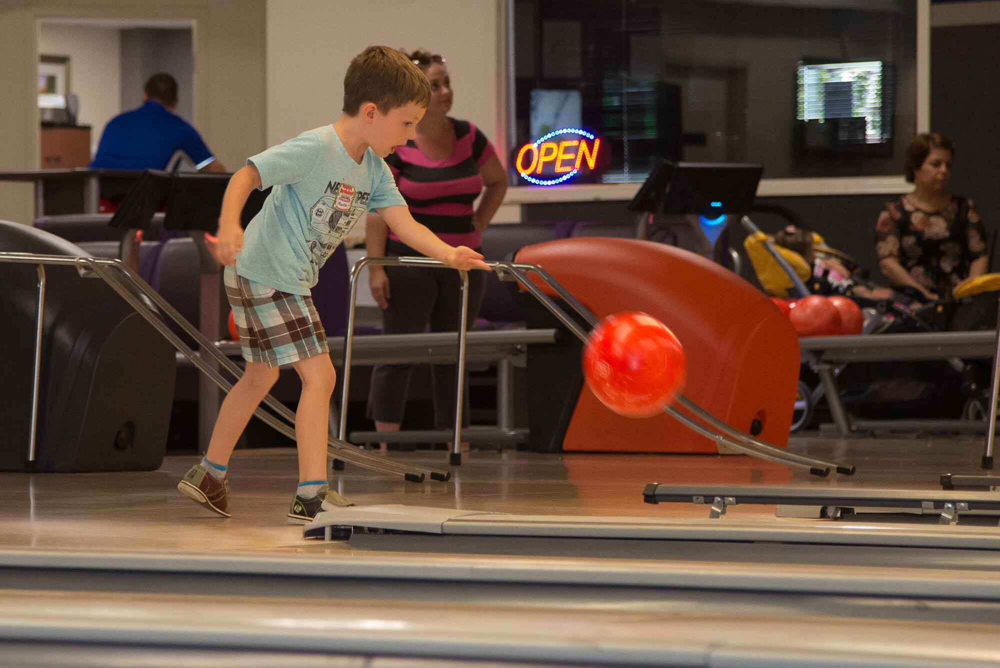 Hunter Kircher bowls during a Hearts Apart event at Hanscom Lanes Sept. 27.