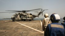 U.S. 5th FLEET AREA OF OPERATIONS (Sept. 21, 2017) – A CH-53E Super Stallion helicopter prepares to depart the amphibious dock landing ship USS Pearl Harbor (LSD 52) after picking personnel up for a transport mission. The 15th Marine Expeditionary Unit is embarked on the America Amphibious Ready Group and is deployed to maintain regional security in the U.S. 5th Fleet area of operations. (U.S. Marine Corps photo by Cpl. F. Cordoba)