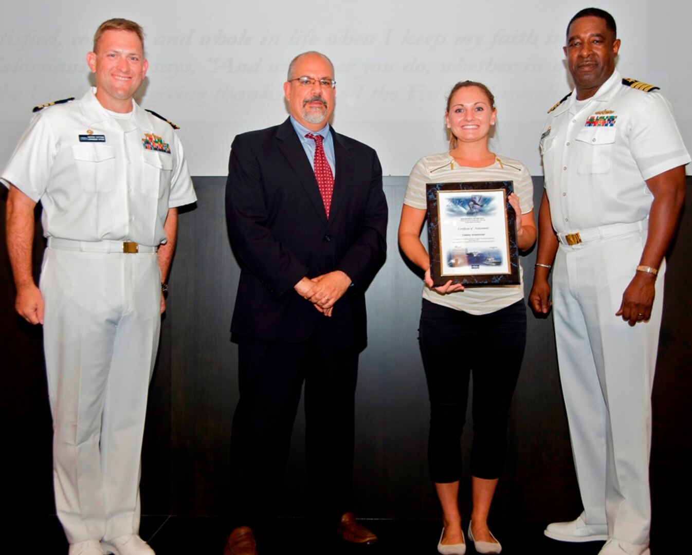 IMAGE: 170919-N-DE005-005 (bachelor's degree):
DAHLGREN, Va. - Lindsey Armentrout receives her certificate of achievement from Naval Surface Warfare Center Dahlgren Division (NSWCDD) Technical Director John Fiore, NSWCDD Commanding Officer Capt. Godfrey 'Gus' Weekes, right, and Combat Direction Systems Activity Dam Neck Commanding Officer Cmdr. Andrew Hoffman at the 2017 NSWCDD academic awards ceremony. Armentrout was recognized for completing her bachelor's in mechanical engineering from Virginia Tech, and commended for her commitment to personal and professional development.