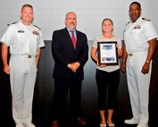 IMAGE: 170919-N-DE005-005 (bachelor's degree):
DAHLGREN, Va. - Lindsey Armentrout receives her certificate of achievement from Naval Surface Warfare Center Dahlgren Division (NSWCDD) Technical Director John Fiore, NSWCDD Commanding Officer Capt. Godfrey 'Gus' Weekes, right, and Combat Direction Systems Activity Dam Neck Commanding Officer Cmdr. Andrew Hoffman at the 2017 NSWCDD academic awards ceremony. Armentrout was recognized for completing her bachelor's in mechanical engineering from Virginia Tech, and commended for her commitment to personal and professional development.