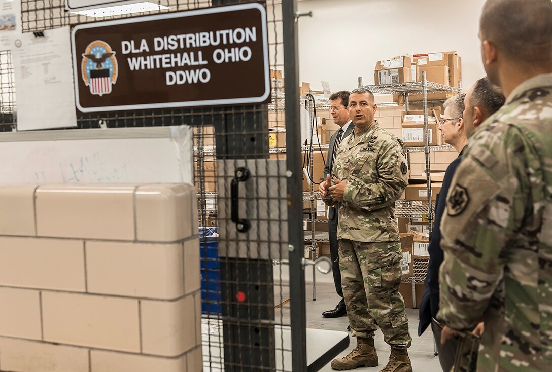 Brig. Gen. Laskodi tours a distribution center at Defense Supply Center Columbus.