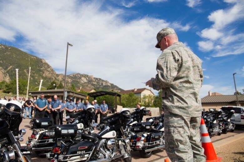 Chaplain (Capt.) John Boulware, 21st Space Wing chaplain, offers the invocation at Cheyenne Mountain Air Force Station, Colorado, Sunday, May 21, 2017, during Defenders of Freedom Veterans Recognition Ride. He fulfills his mission by spending most of his time among those he serves. (Courtesy photo)