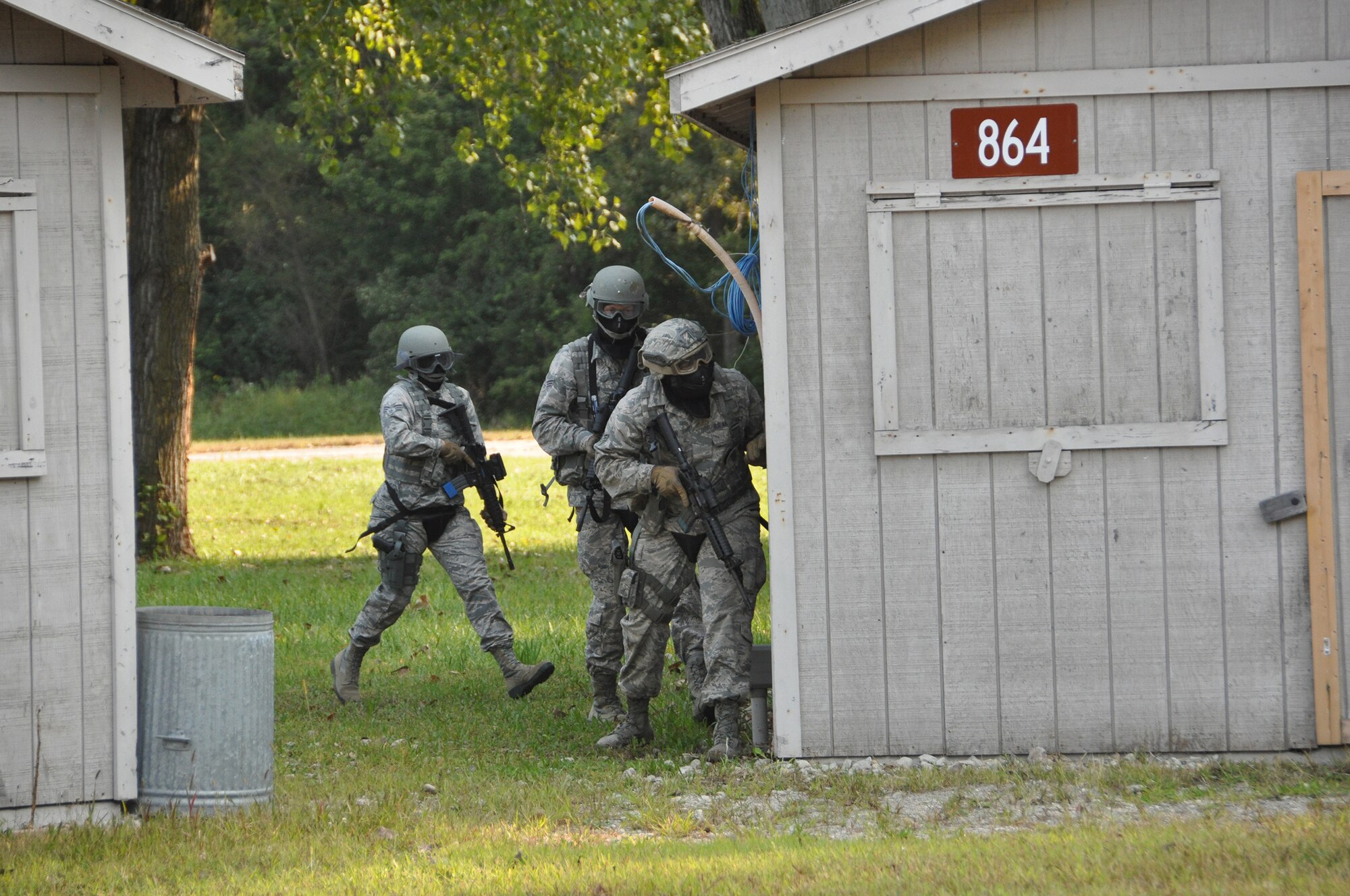 445th Security Forces Squadron Airmen participate in Shoot, Move, Communicate training conducted at the Warfighter Training Center here Sept. 10, 2017. Hostage situations, convoy operations and ambush tactics were just a few of the nearly one dozen scenarios executed during the semi-annual sustainment training