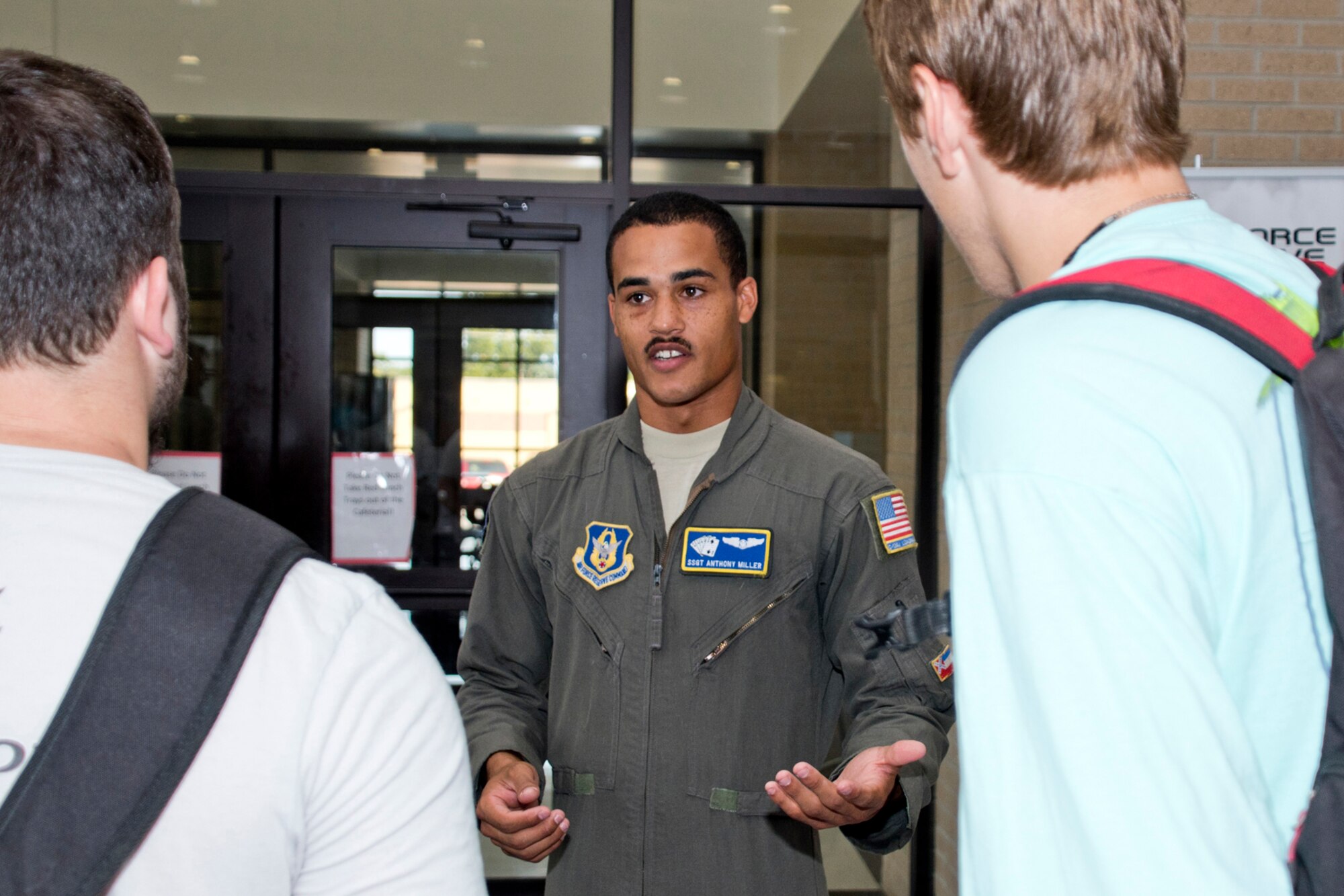 U.S. Air Force Reserve Staff Sgt. Anthony Miller, a loadmaster assigned to the 327th Airlift Squadron, 913th Airlift Group, speaks with potential recruits during the annual Cabot College and Career Fair at Cabot High School in Cabot, Ark., Sept. 28, 2017. More than 65 colleges, technical and vocational representatives and with military recruiters were on hand to answer questions for the juniors and seniors who attend the event. (U.S. Air Force photo by Master Sgt. Jeff Walston/Released)