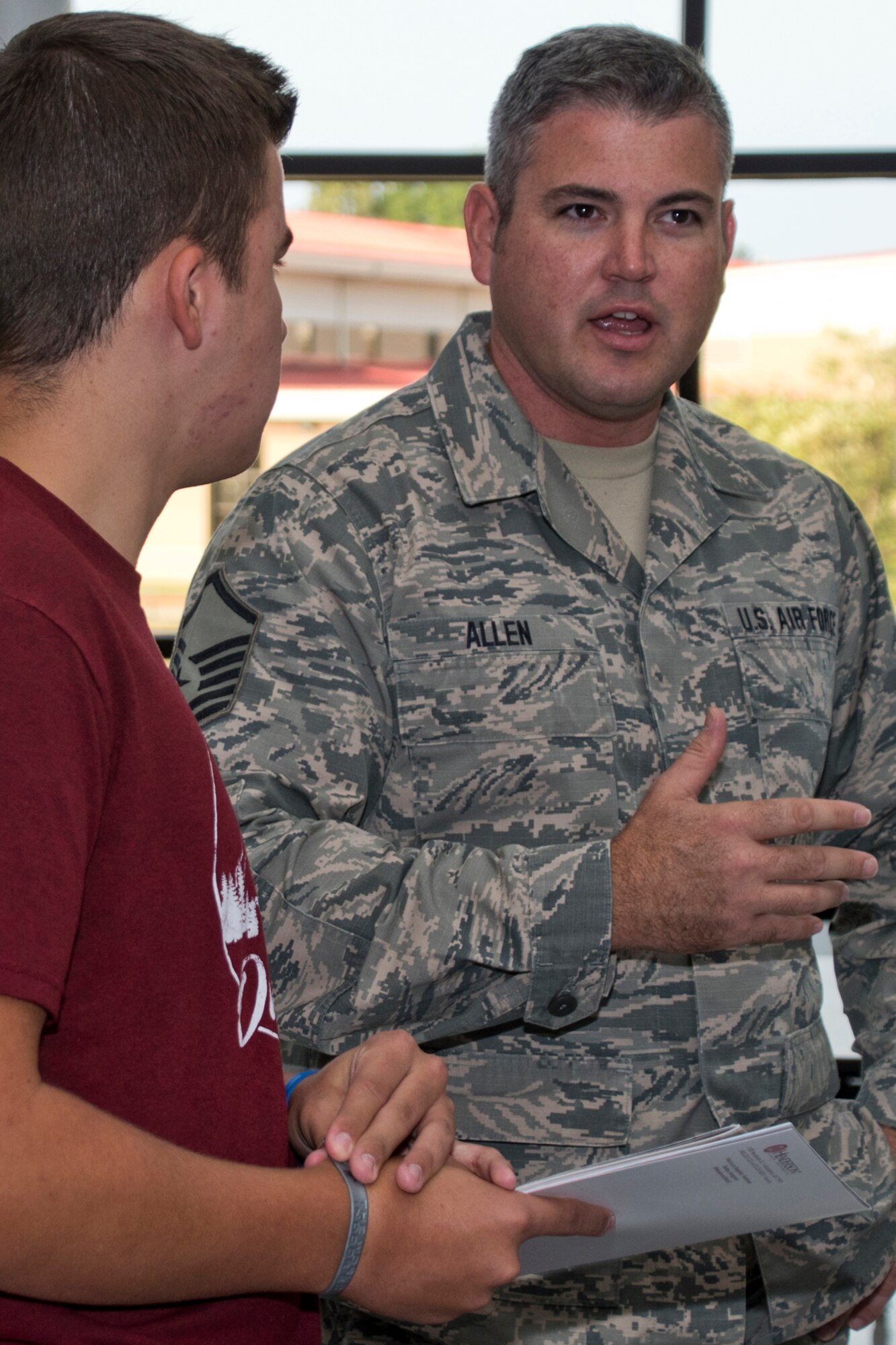 U.S. Air Force Reserve Master Sgt. Mark Allen, program manager for the 913th Airlift Group’s Development Training Flight, speaks with a potential recruit during the annual Cabot College and Career Fair at Cabot High School in Cabot, Ark., Sept. 28, 2017. Approximately 1,000 juniors and seniors spoke with representatives of local colleges, technical and vocational schools along with military recruiters at the event. (U.S. Air Force photo by Master Sgt. Jeff Walston/Released)