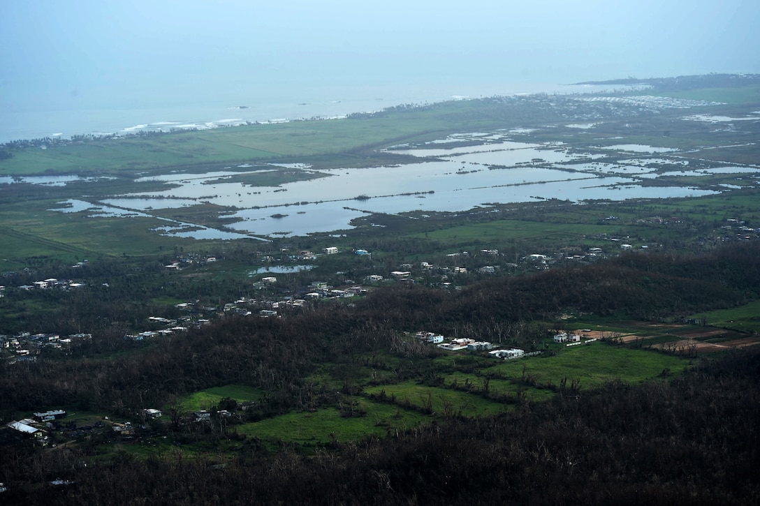 A view of buildings and flooding from above.